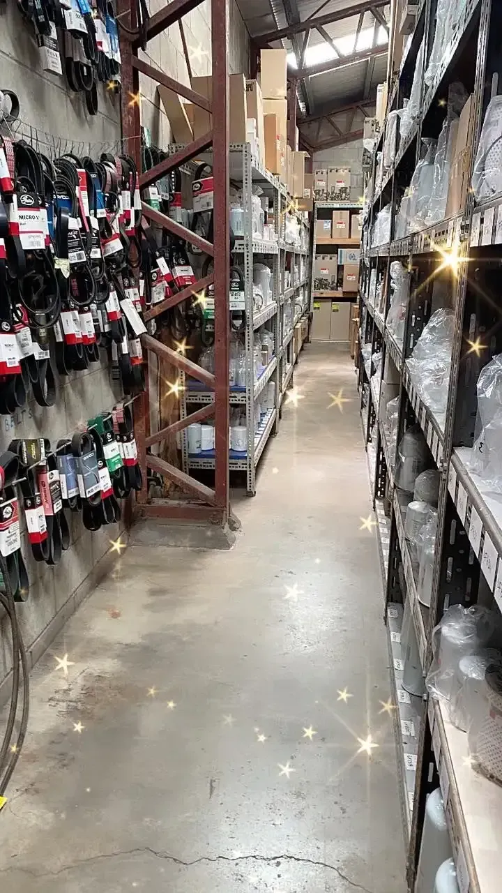 A Warehouse Filled With Lots Of Shelves And Boxes — Filta-Wash Mackay In North Mackay, QLD