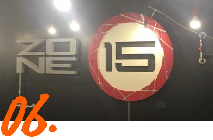 A sign that has the number 15 on it