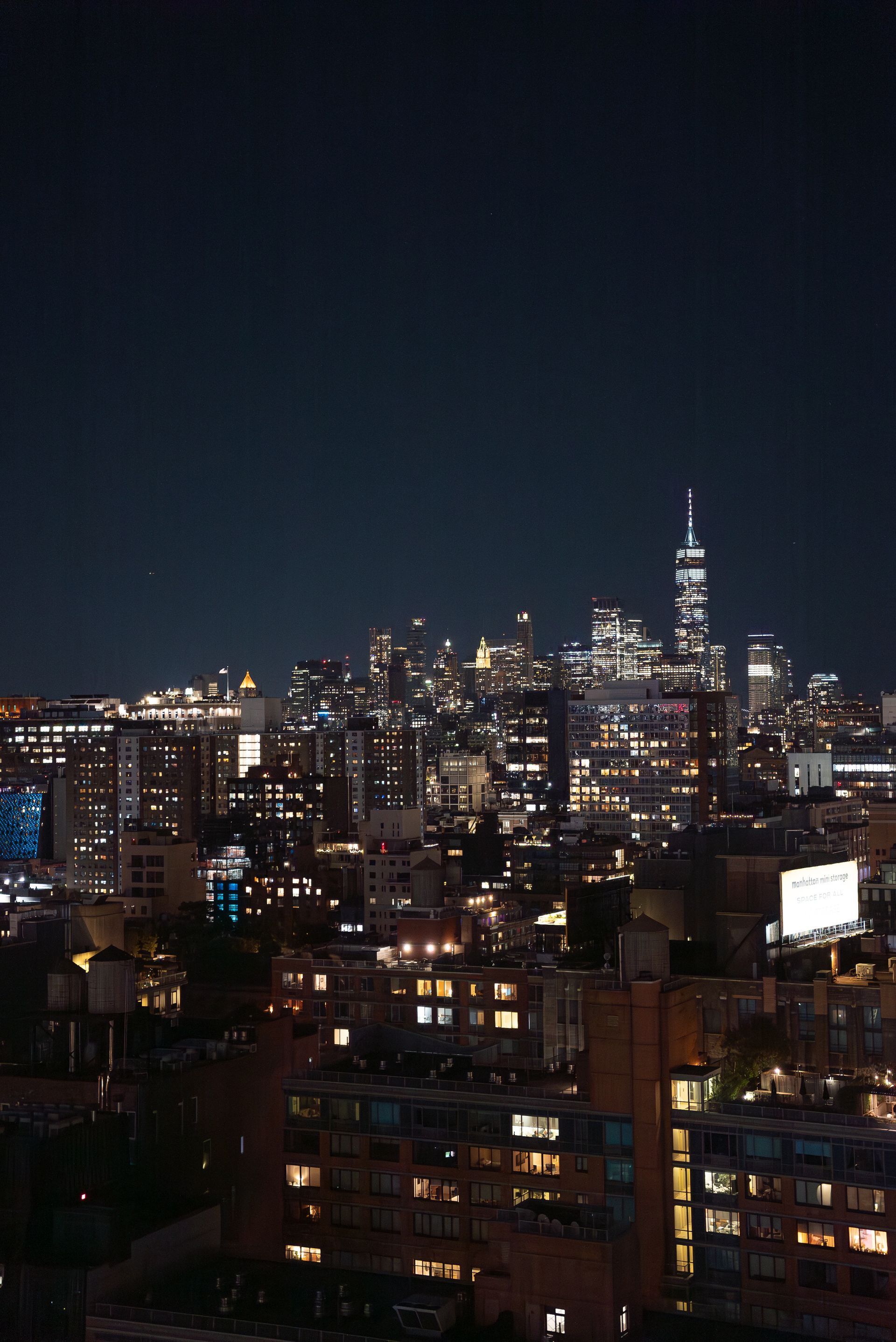 an aerial view of a city skyline at night .