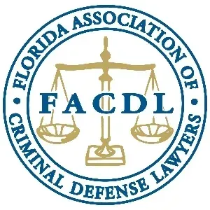 Logo for Florida Association of Criminal Defense Lawyers, scales of justice in the center, blue and gold.