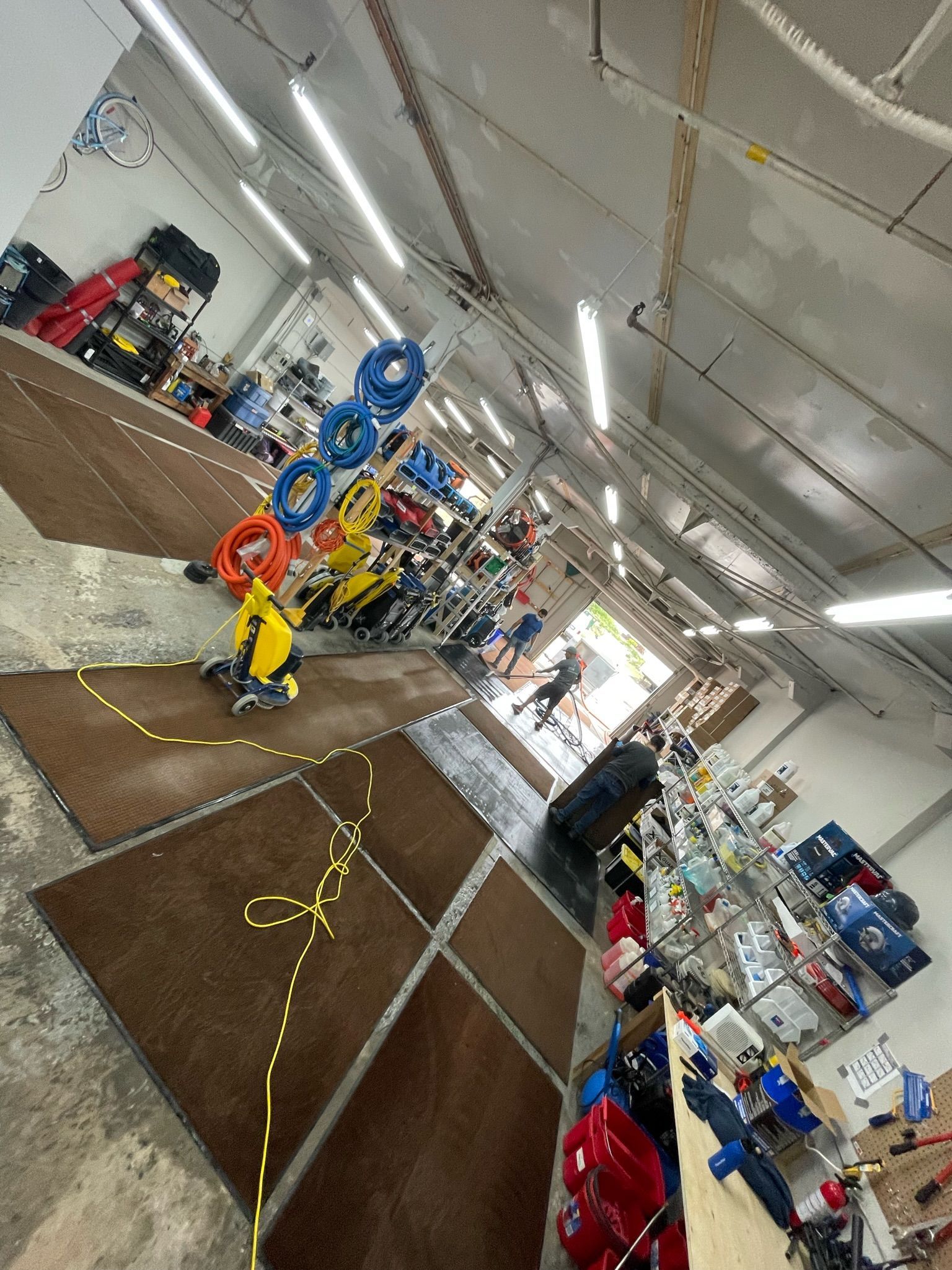 A blurred image of a room with a lot of toys on the floor