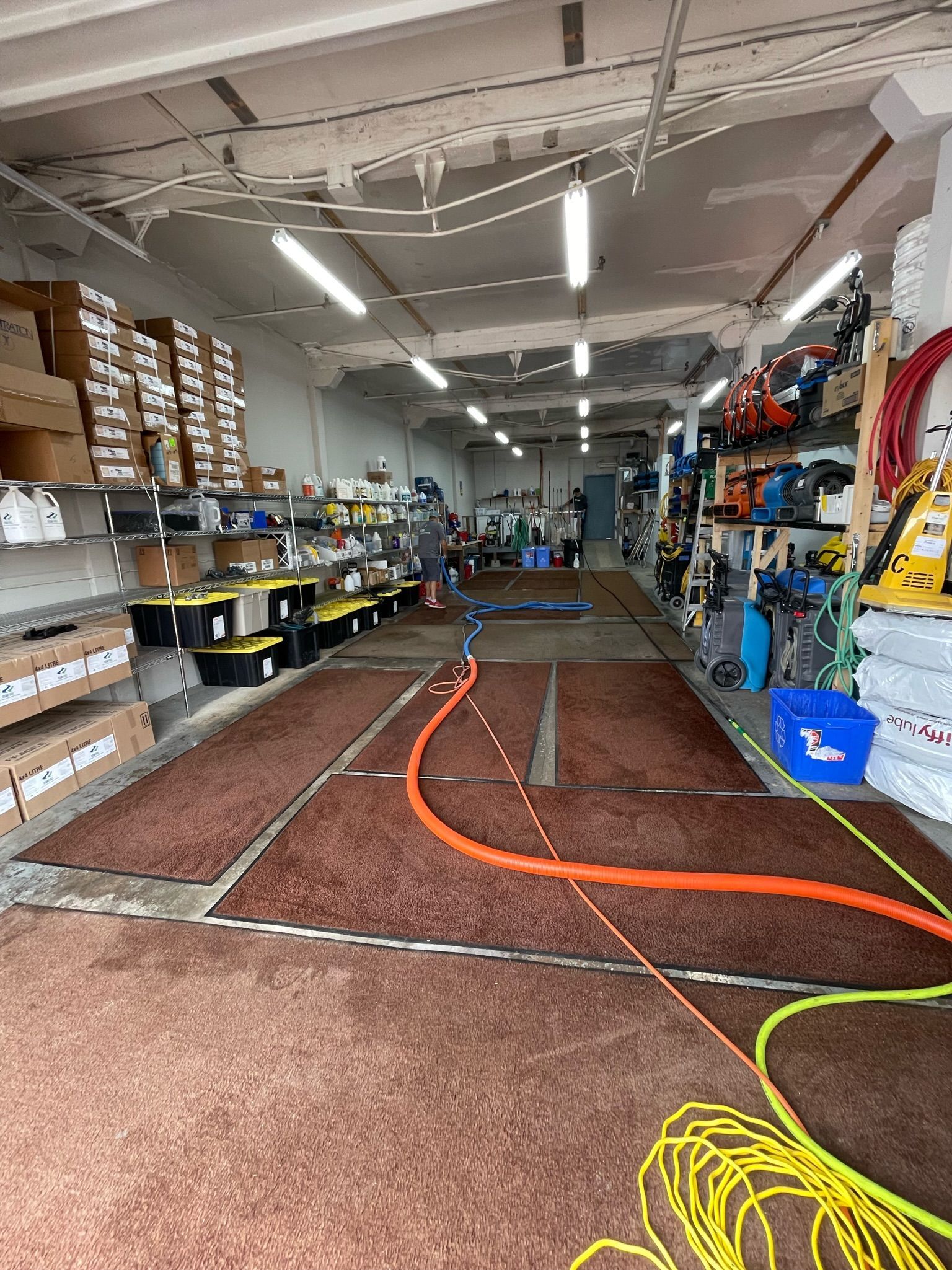 A large room filled with lots of tools and boxes.