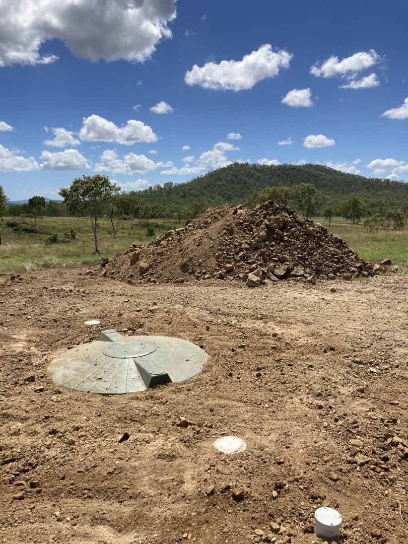 Modern Bathroom Vanity With a Black Cabinet — Mates Plumbing and Gas in Lammermoor, QLD