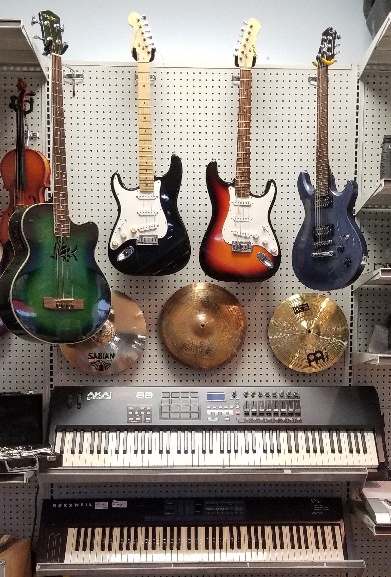 Musical Instruments — Electric Guitars and Piano in Raleigh, NC
