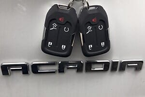 Acadia and Two Remote Control Key — Car Keys Replacement in Des Moines, IA