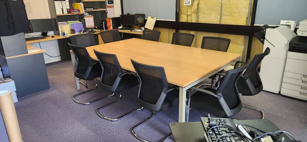 A Conference Room With a Large Table, Chairs, and Computers — Clancy's Office & Emporium in Taree, NSW