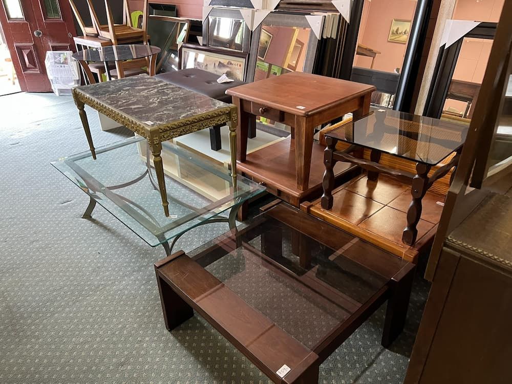 Various Tables of Different Styles and Materials Are on Display Indoors — Clancy's Office & Emporium in Taree, NSW