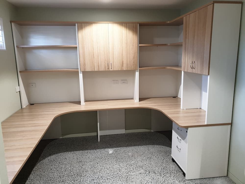 A Custom Fit-out Office Desk With Shelving and Cabinets — Clancy's Office & Emporium in Taree, NSW