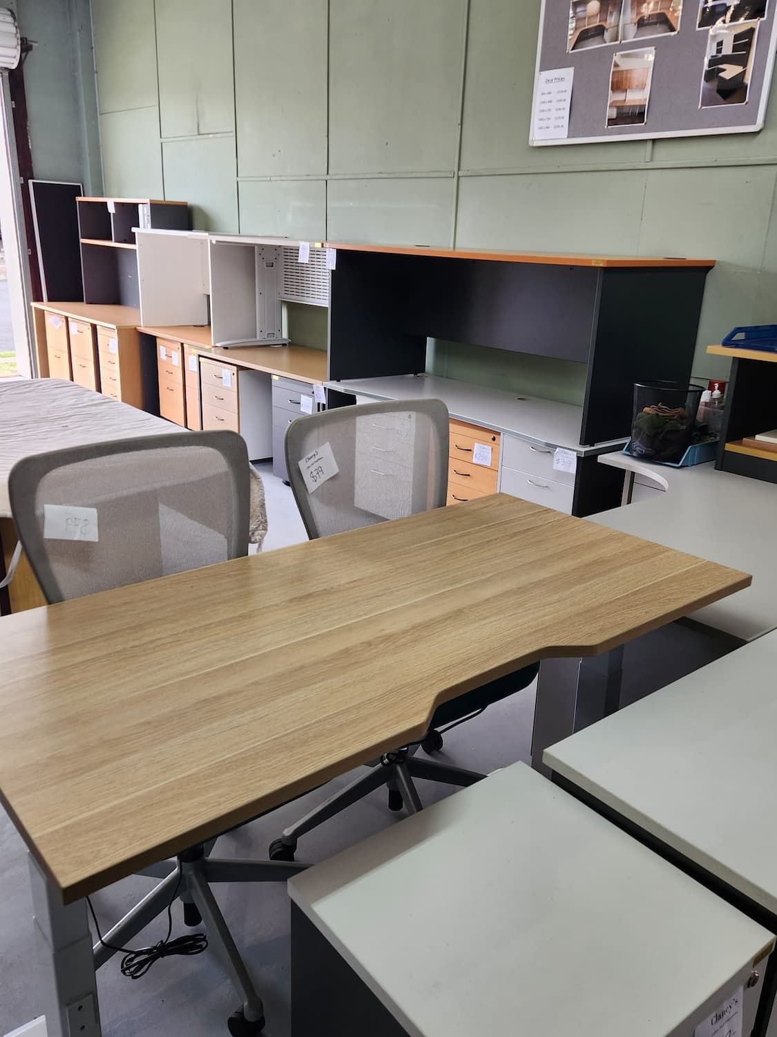 A Light-coloured Desk and Two Chairs in an Office Supply Store — Clancy's Office & Emporium in Taree, NSW