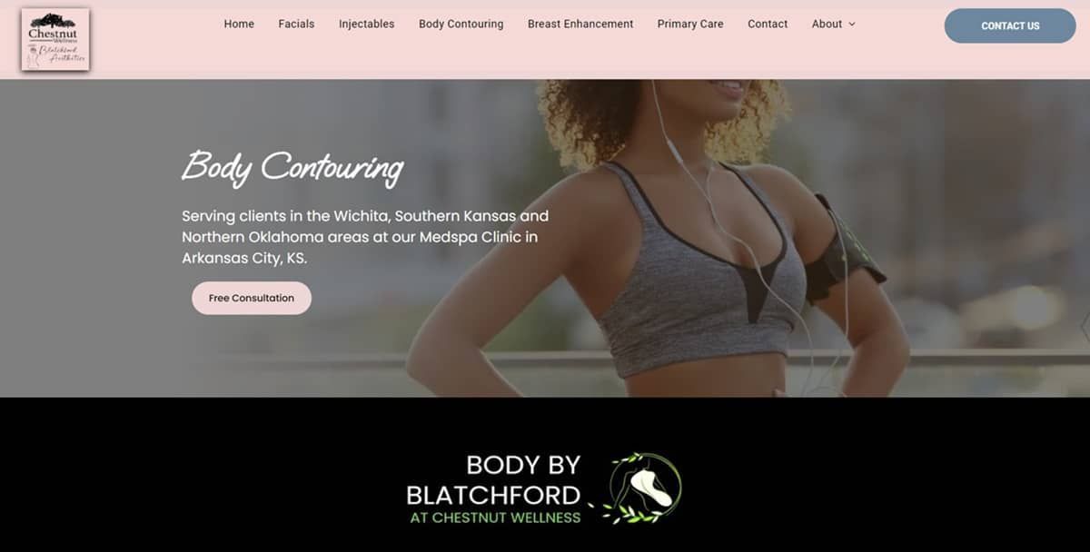 a woman is standing on a balcony wearing headphones and a sports bra .