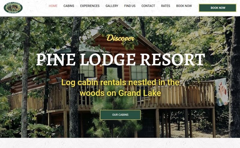 The pine lodge resort website shows a log cabin nestled in the woods on grand lake.