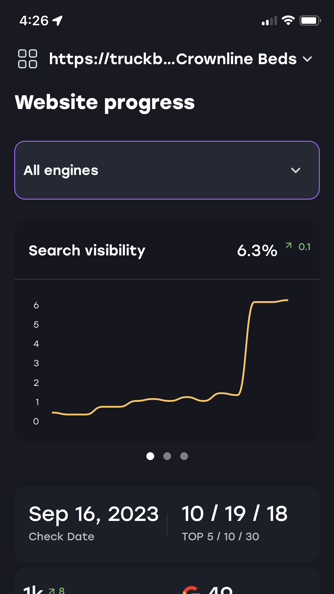 a phone screen shows the website progress of crownline beds