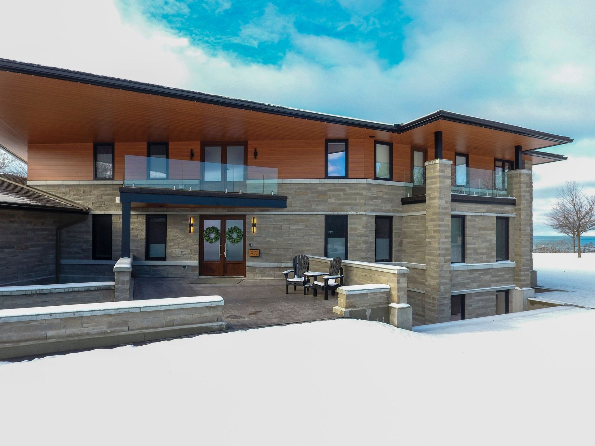 A large house with a lot of windows and a balcony