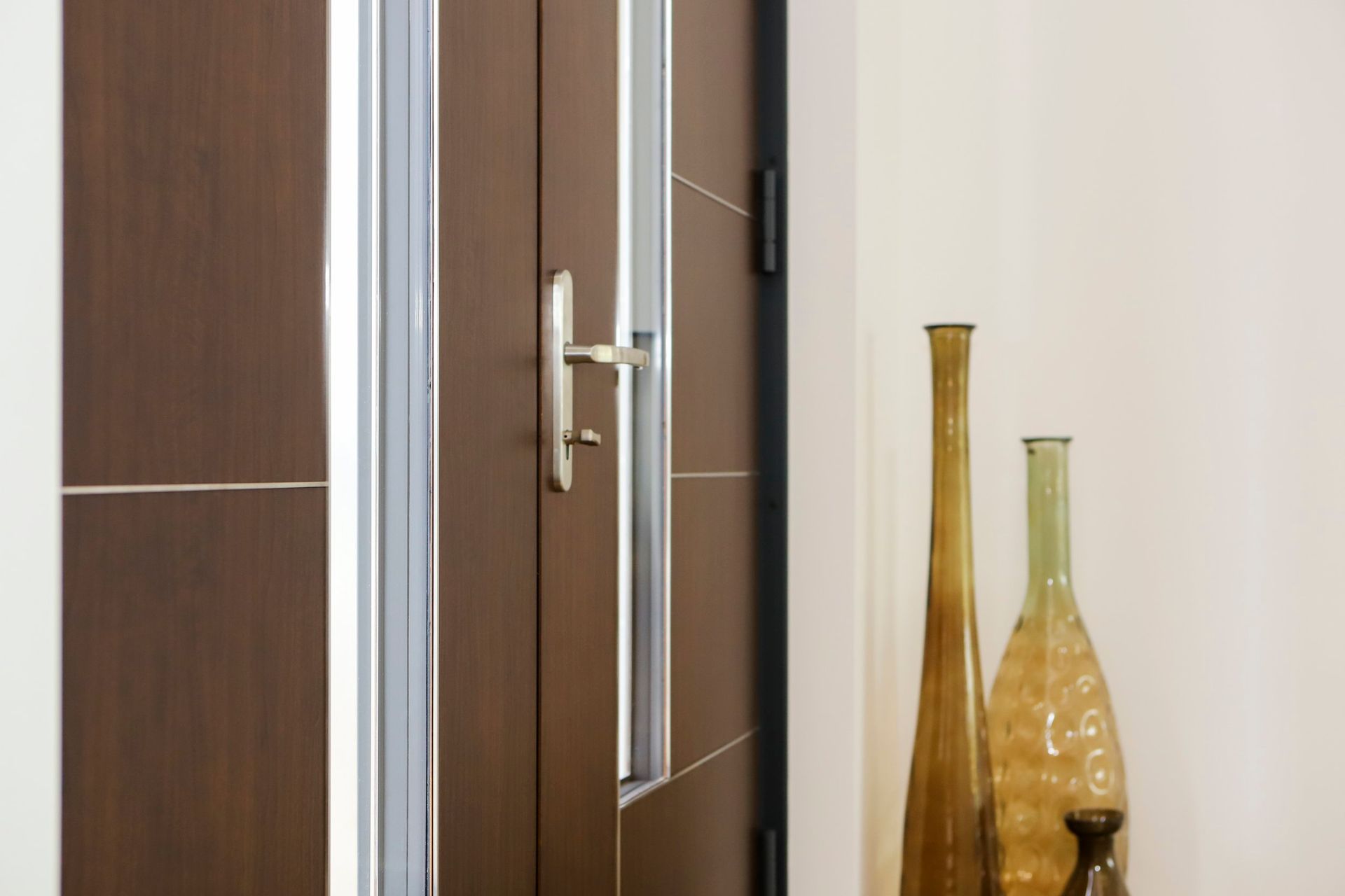 A door with two vases in front of it