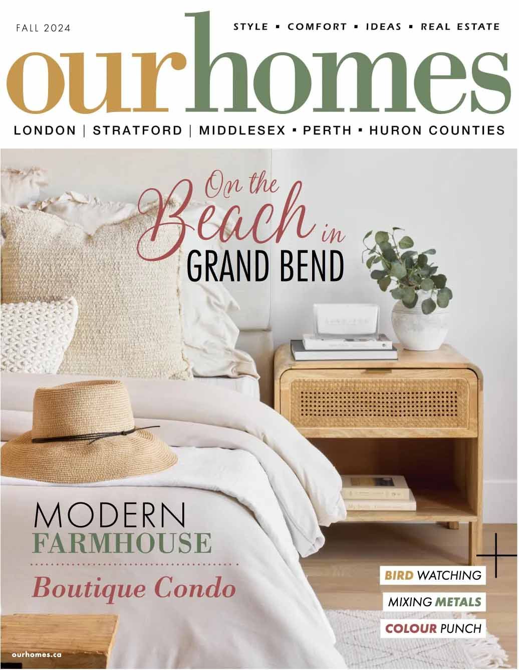 The cover of our homes magazine shows a bedroom with a bed and a nightstand.