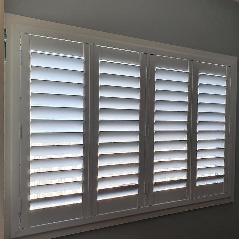 White Plantation Shutters On A Room