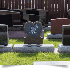 A heart shaped gravestone with the number 15 on it