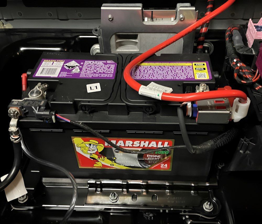 A Marshall Battery Is Sitting In A Car — Mackay Car & Commercial Pty Ltd In Paget, QLD