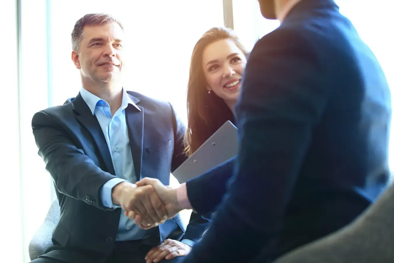 two professionals shaking hands