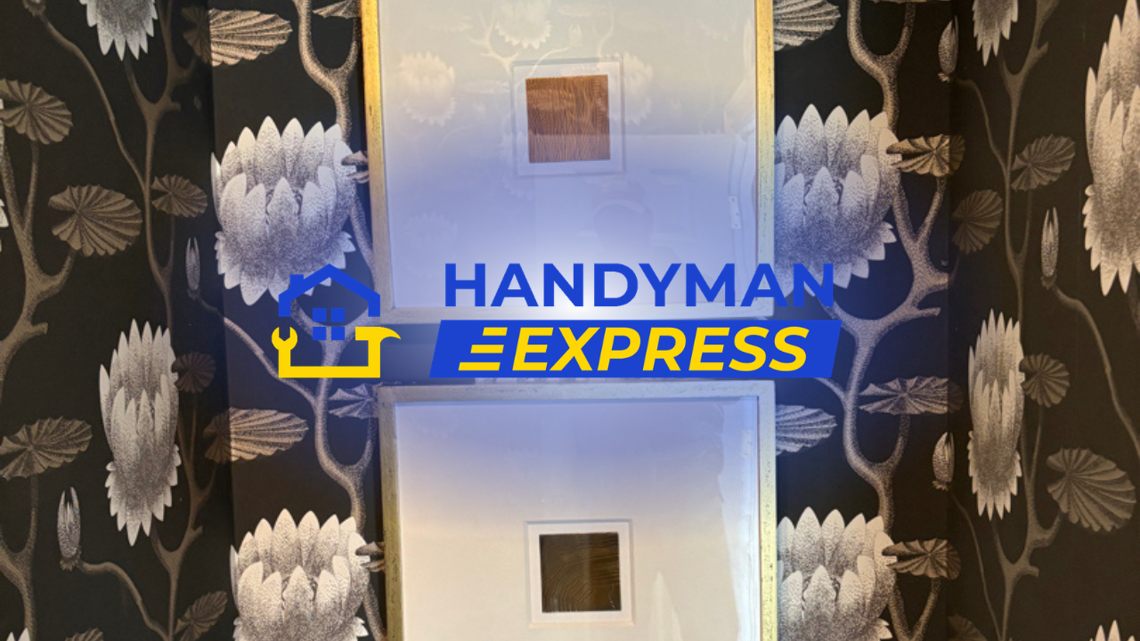 Handyman Express logo on a wall, blue and yellow text with a house icon on floral wallpaper