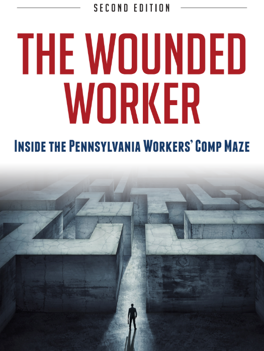 Man in suit, glasses, smiling; formal business portrait.