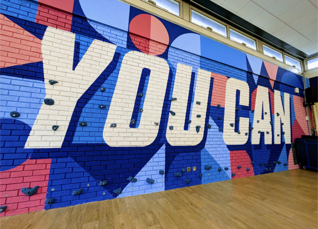 Climbing wall with the words 