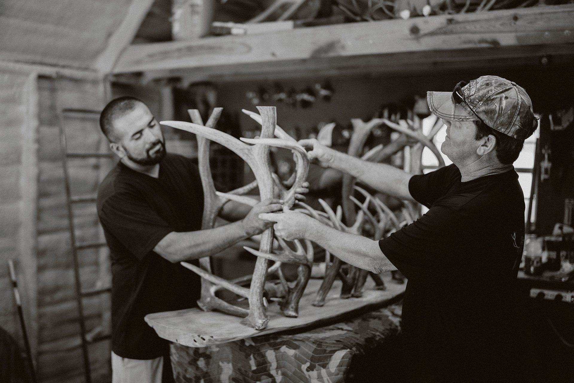 Terry Wilson building a wooden table with antler legs