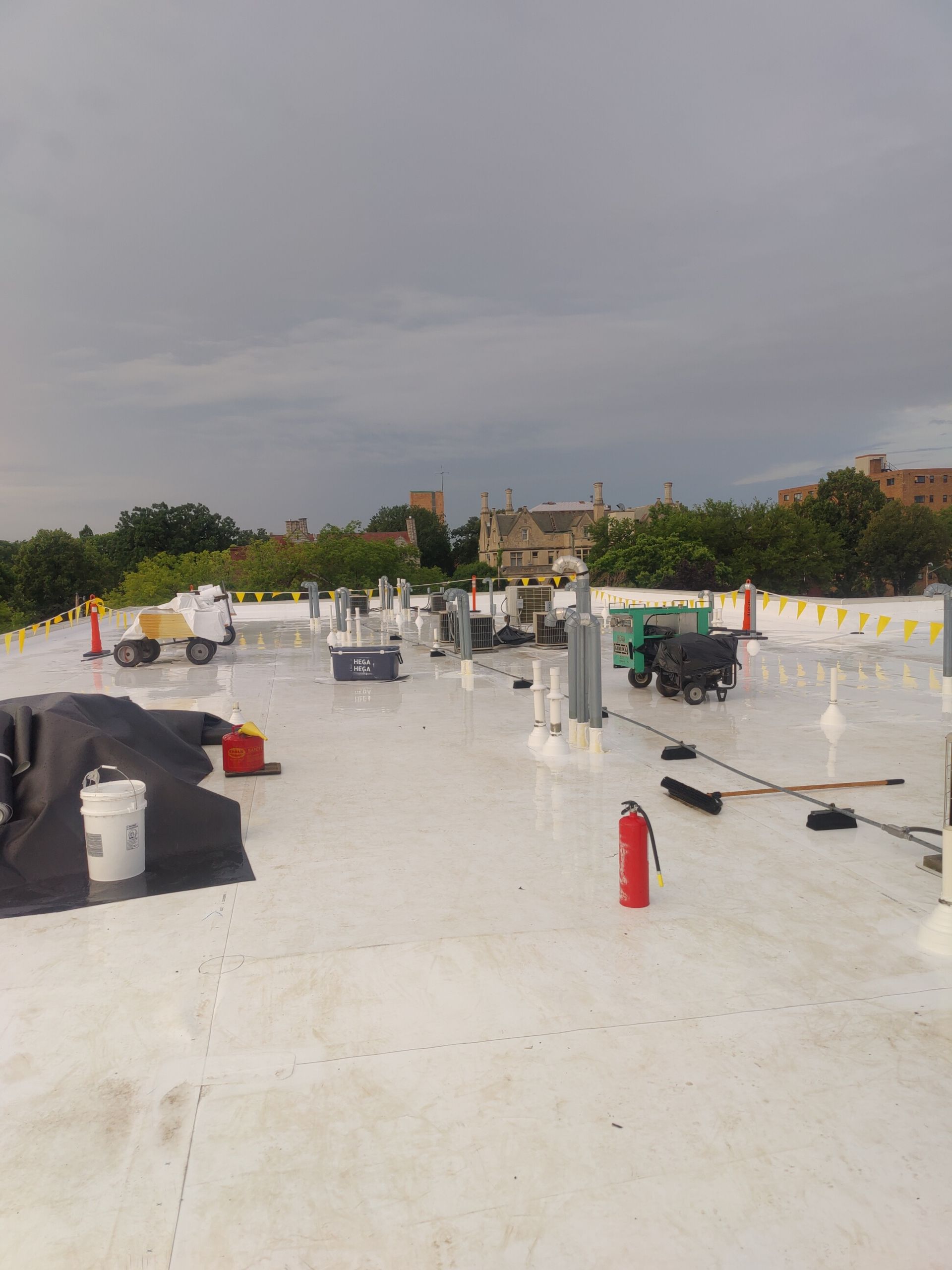 A white roof with a fire extinguisher on it