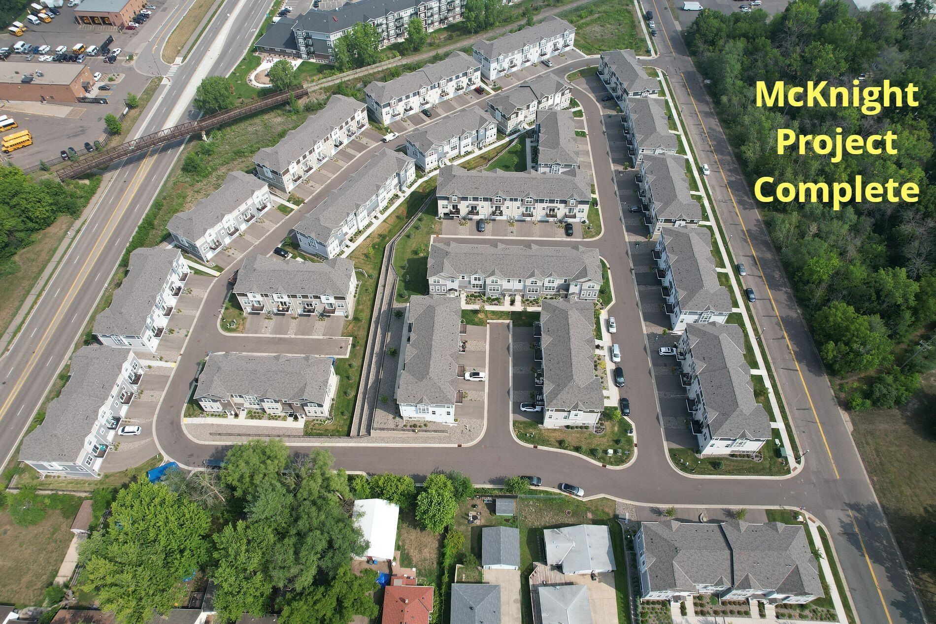 An aerial view of a mcknight project complete apartment complex