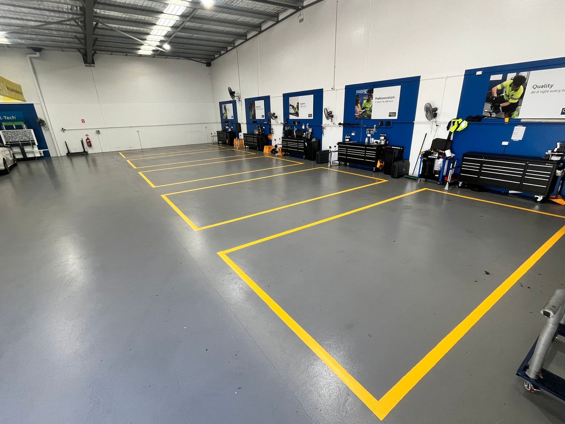 woman standing in empty warehouse