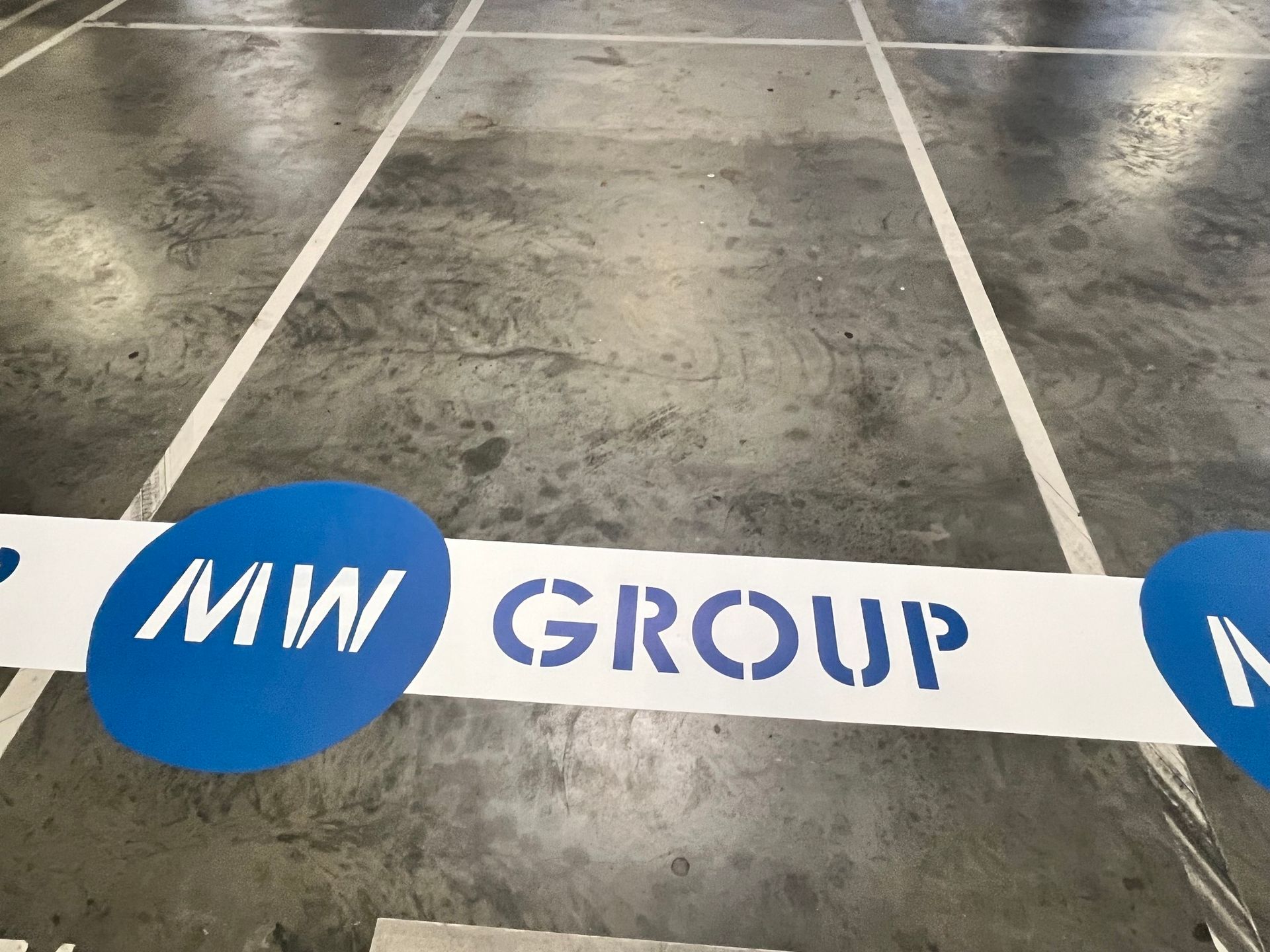 White lines and blue logo 