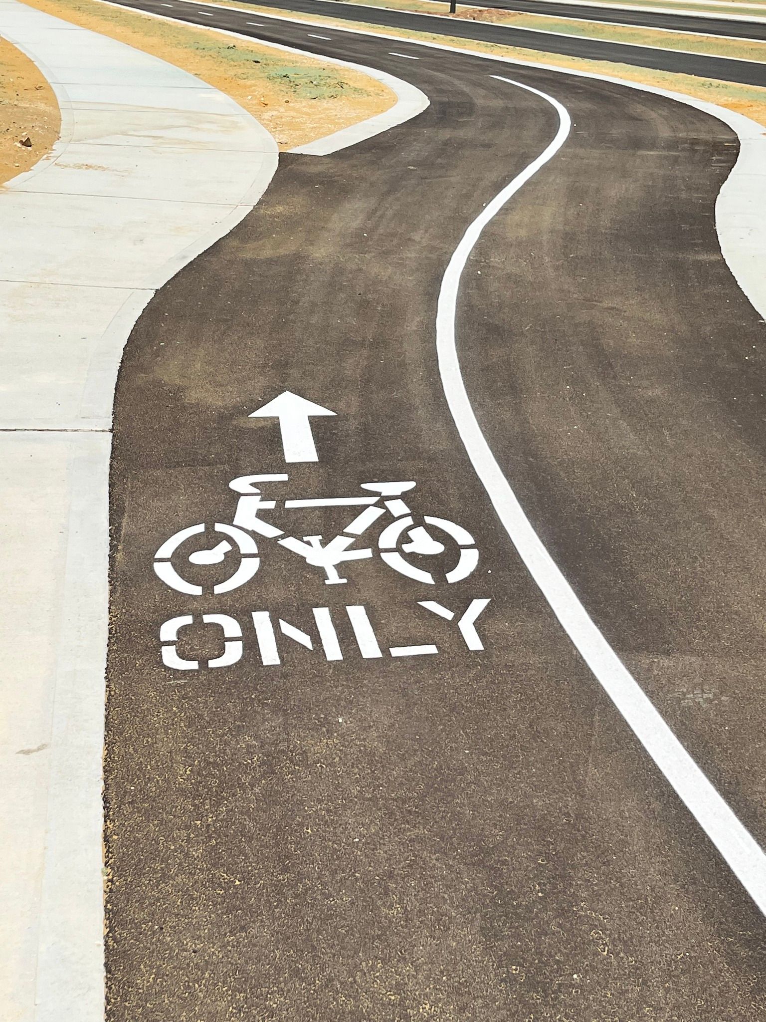 Bike path marked with a bicycle symbol and 