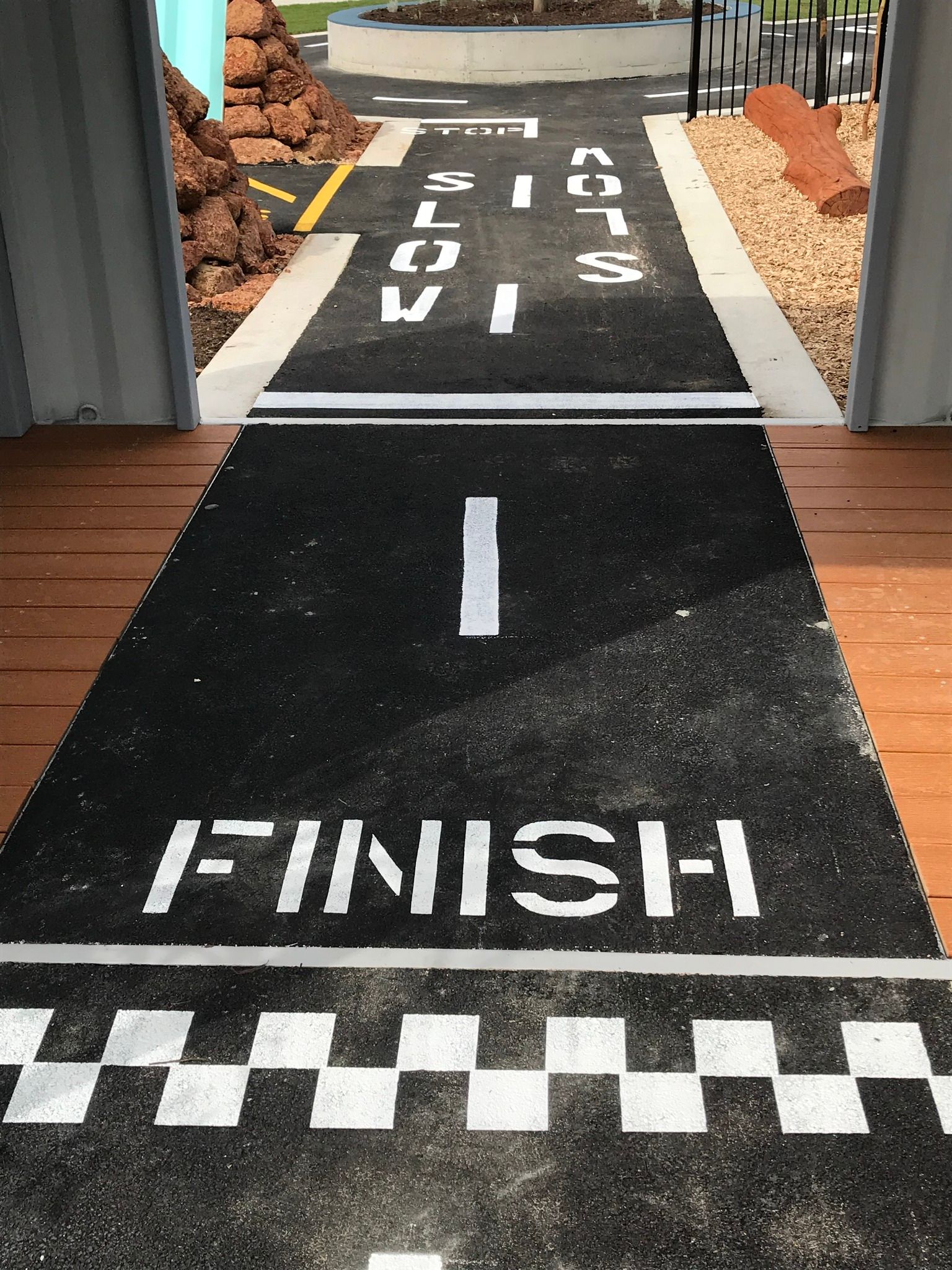 Asphalt path with painted words 