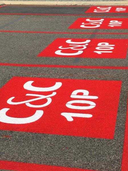 Red painted parking bays marked 