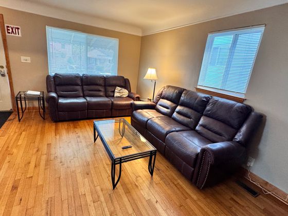 A living room with a couch and a coffee table