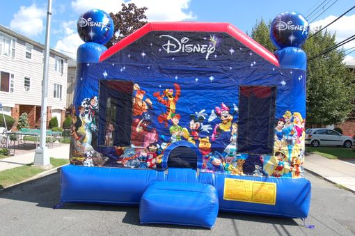 Disney Character Bounce House Inflatable 15' x 15' .  This is amazing fun for all ages, with Mickey, Minnie, Pooh, Tigger, Snow White, the gangs all here for a day of fun.