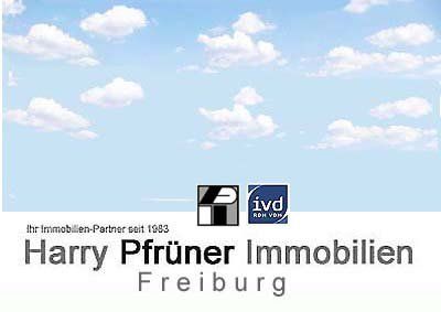 Logo von Harry Pfruner Immobilien Freiburg, mit Himmelshintergrund und dem IVD-Logo.
