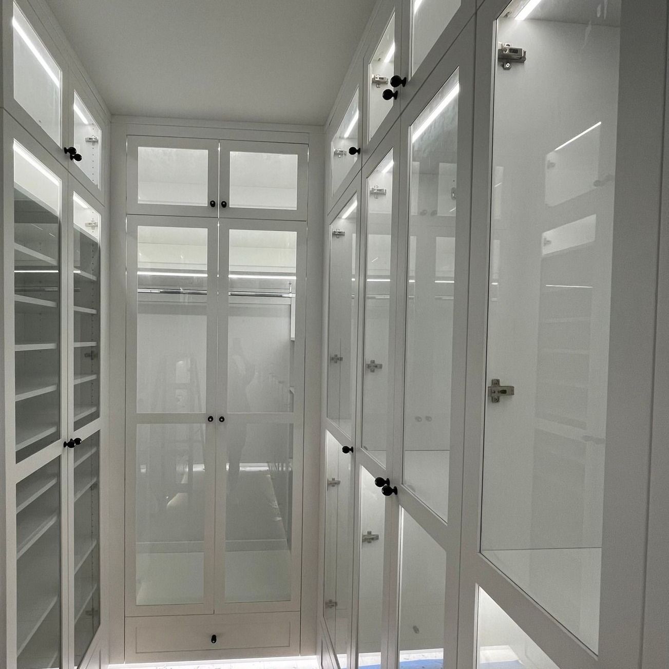 A Glass Walk-in Closet Installed in Central Missouri By LB Classic Closets.