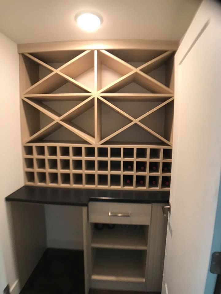 Build a Custom Kitchen Pantry With Wine Racks, Drawers & More From LB Classic Closets.