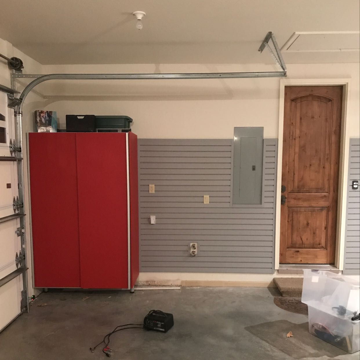 Red Cabinets & Hanging Wall, Installed in the Columbia, MO Area By LB Classic Closets.