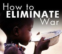 A young boy is drinking water from a bowl.