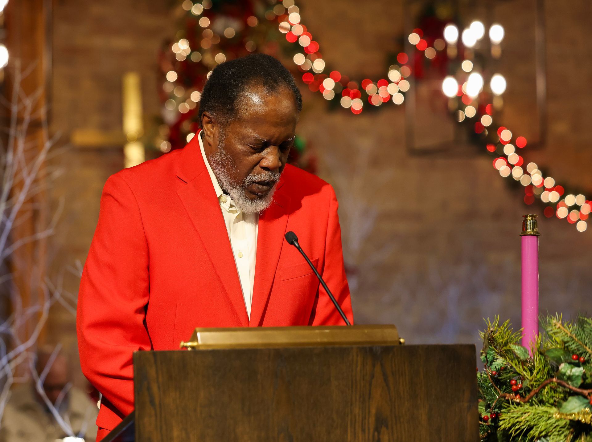 Reader at Christmas Eve service