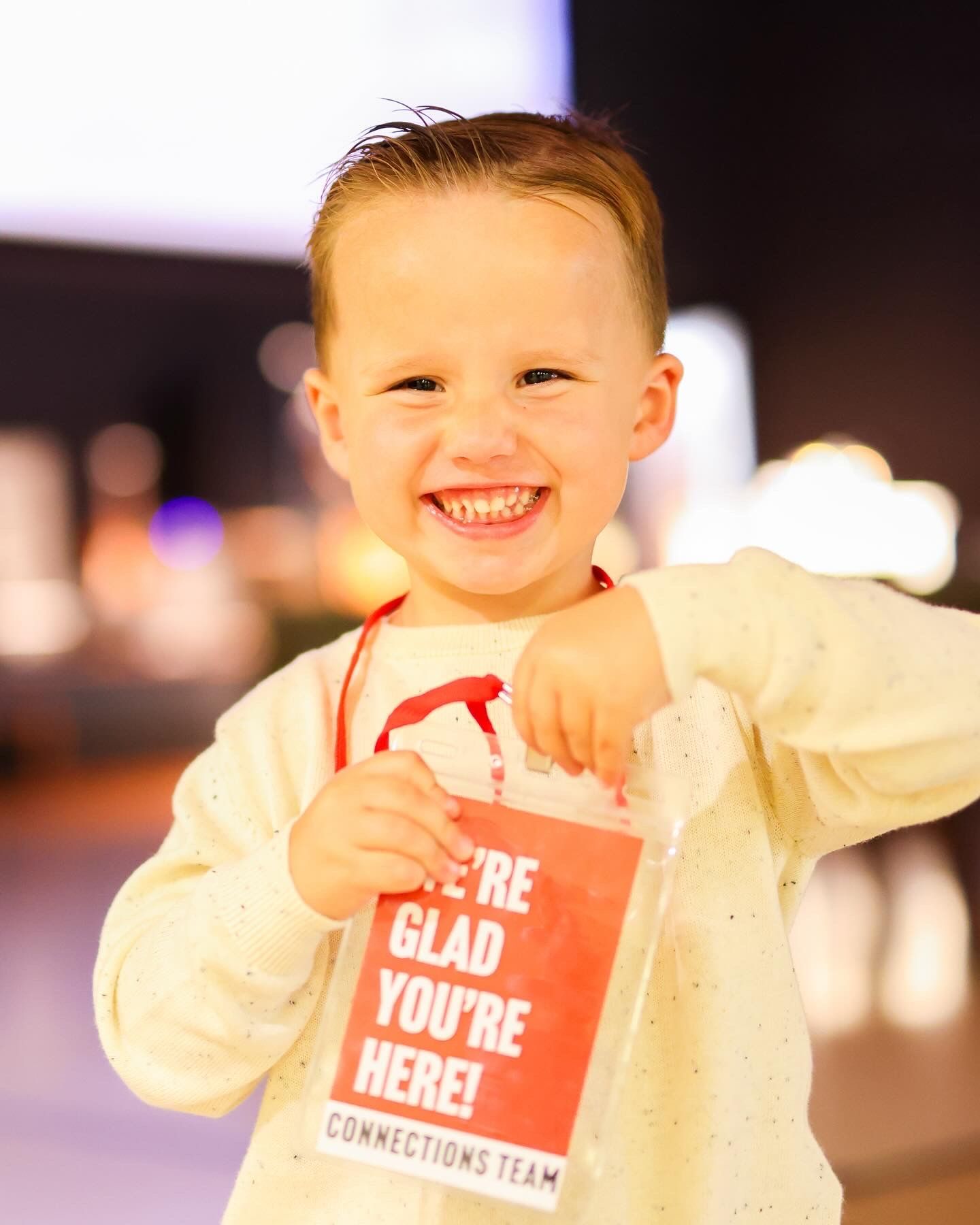 Child volunteering as a door greeter