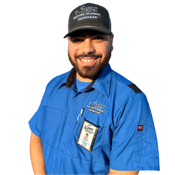 A man with a beard wearing a blue shirt and a black hat