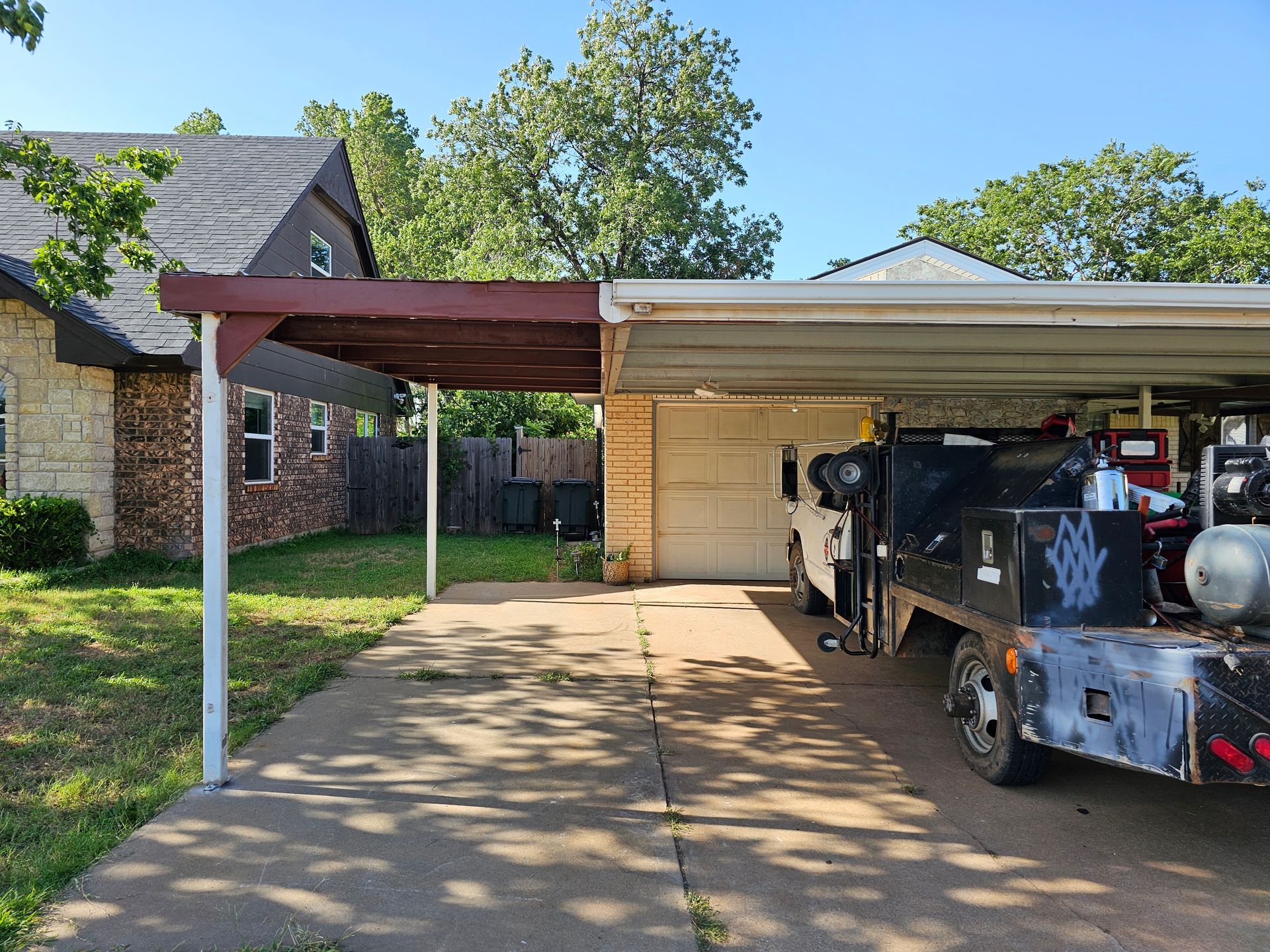 A large door is open in a dark room.