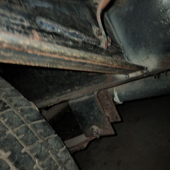 A close up of the underside of a vehicle