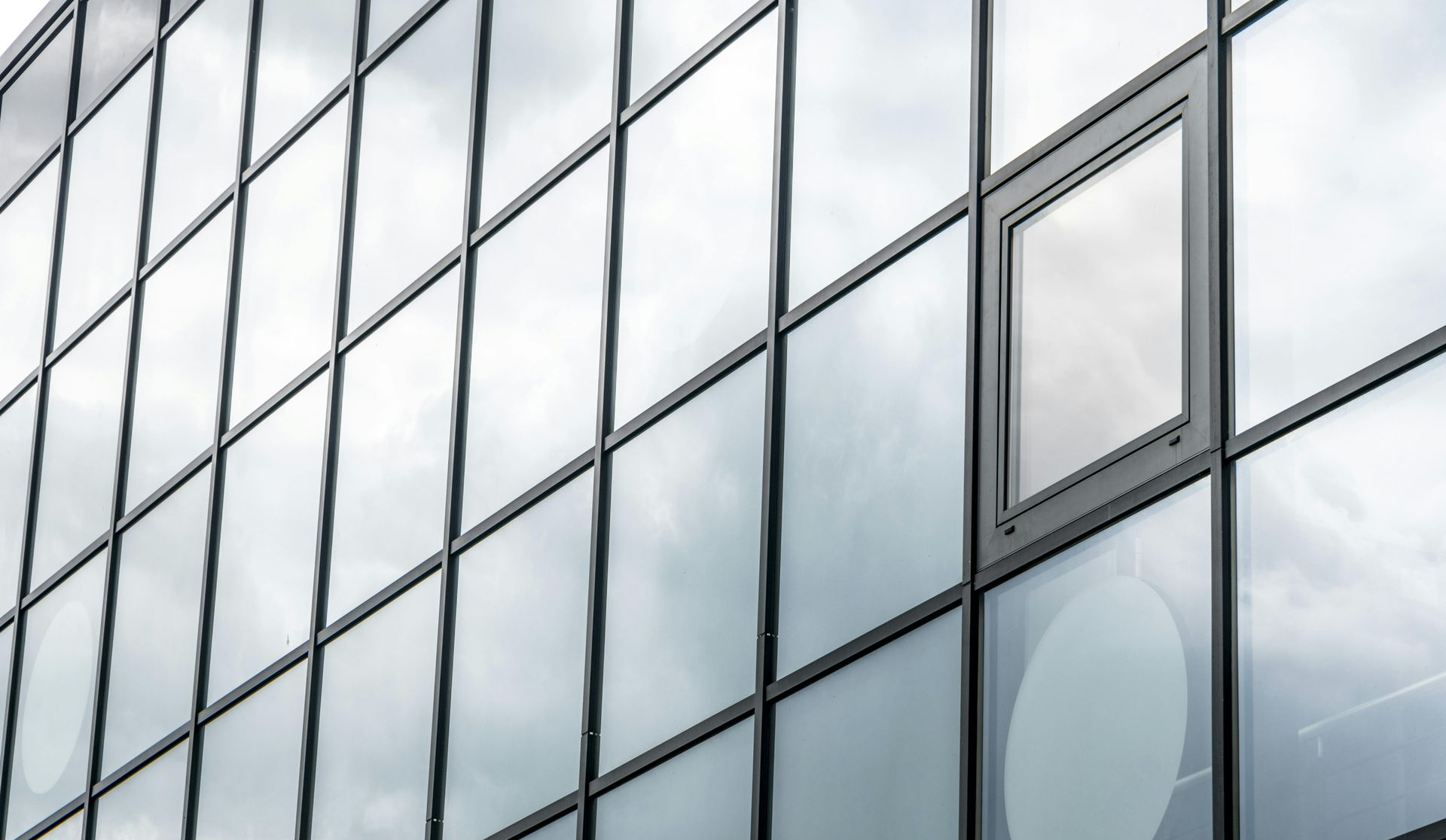 broken window glass secured with safety film