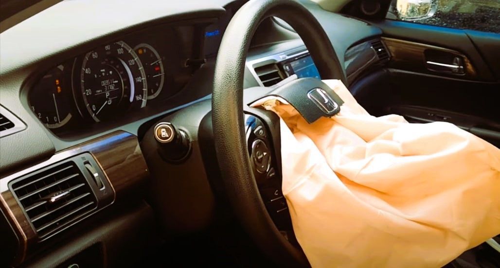 Image showing the process of removing an airbag from a vehicle