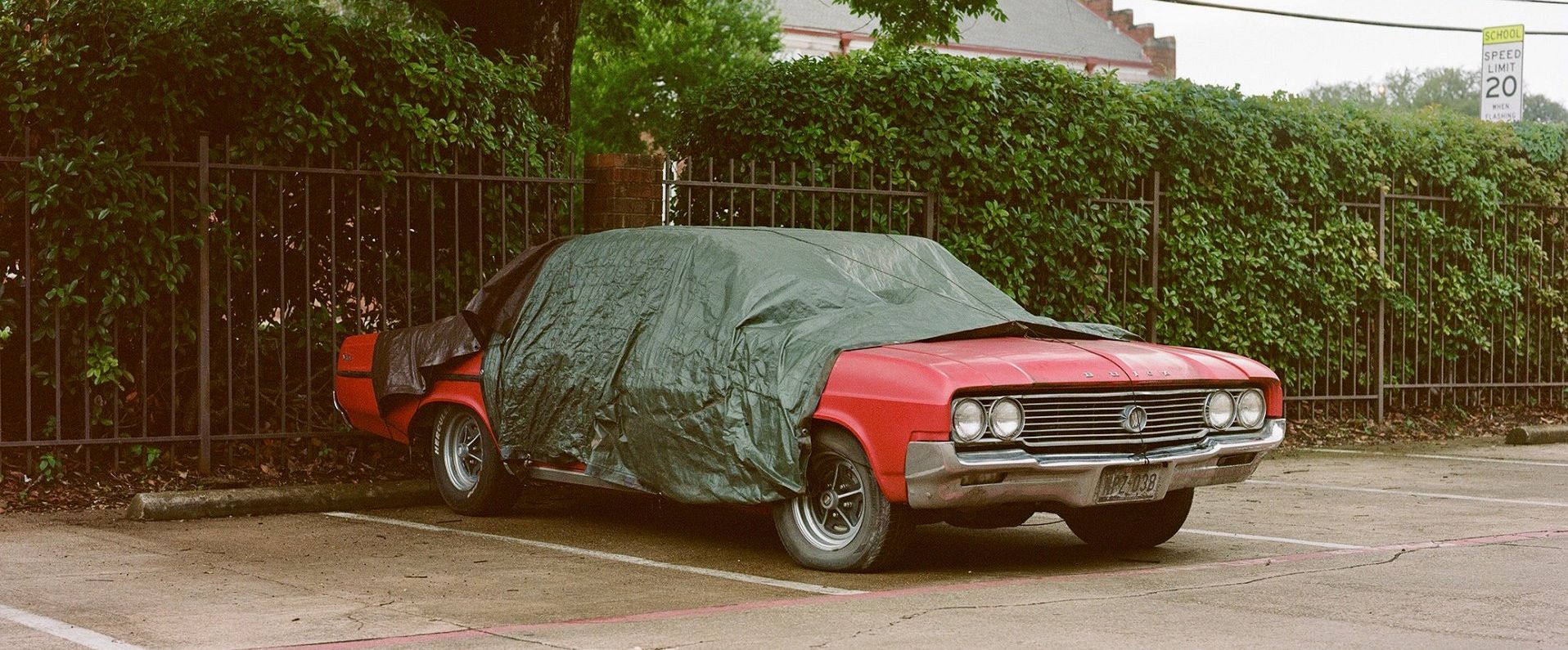 partially covered vehicle left idle