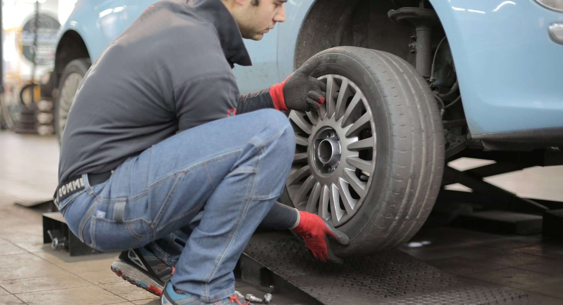 mobile mechanic changing a tire